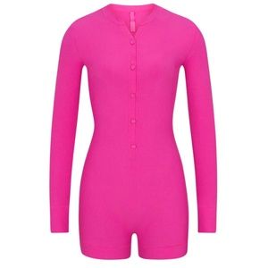 SKIMS SOFT LOUNGE BUTTON UP HENLEY ONESIE in PINK